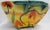Everyone needs hearts in their home! This is a colorful bowl of yellow, orange, red and green with hearts flowing over the...