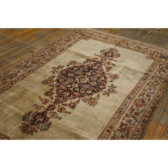 This exceptional 1940 Antique Qum Silk Persian Formal rug is a collector's masterpiece from central Iran. Woven just...