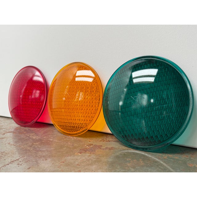 Authentic vintage glass traffic signal lenses manufactured by Eagle Signal Corporation. This matching set includes red,...