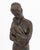 Tanya Poust (American, XX) Mother and Child Patinated Bronze Sculpture, mounted on a white marble base. 18.25" H x 4.25" W...