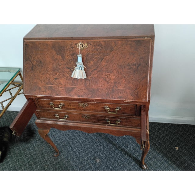 Beautifully crafted Walnut drop front writers desk . Excellent leather tooled interior, walnut inner side , many...