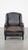 This fantastic black cowhide armchair fits easily into almost any interior. It has a high back and is finished with...