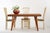 Four Italian dining chairs by Pietro Costantini, imported by Ello, circa 1970s/1980s. The curved seats are generous and...