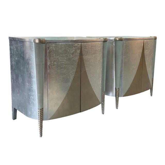 A pair of magnificent Art Deco chests decorated in two-tone silver leaf and seafoam green shagreen. Each cabinet features...