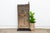 From the Bandiagara escarpment region of central Mali, this two-plank granary door retains its complete, original hand-...
