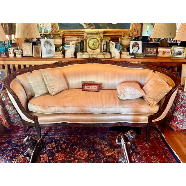 Selling this ornately carved wooden Antique Settee/ Couch. I unfortunately don’t have any information on the origins or...