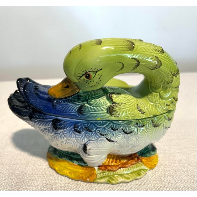Add a splash of charm to your vanity or tabletop with this delightful Mid-Century Modern Neiman Marcus Porcelain Duck...