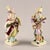 Porcelain pair "Chinese Musicians". Represents a lady and a man in colorful stylized oriental outfits, performing...
