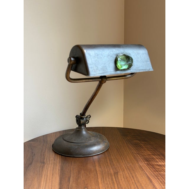 An early 20th-century American adjustable banker’s desk lamp by S. Robert Schwartz & Bro. of New York, featuring a...