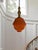 This one-of-a-kind 21‑inch by 12‑inch pendant light has a striking mid‑century presence, built around a heavy...