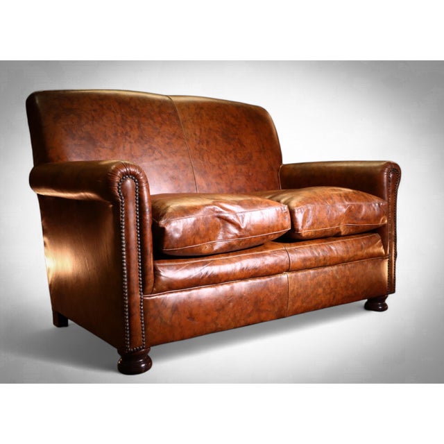 Up for grabs here is a stunning midi 2 seater moustache back sofa by tetrad. model: prince colour: brompton tan...