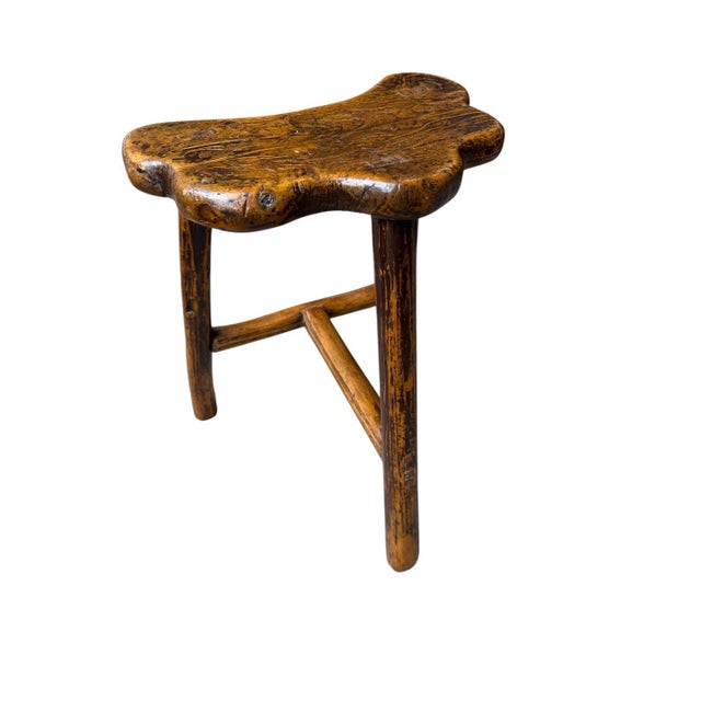 Beautiful 3 legged stool. Nice side or accent piece.