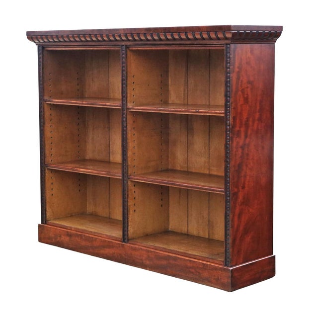 A rare 19th-century mahogany bookcase with attractive age, colour, and patina, that would make a wonderful statement piece...