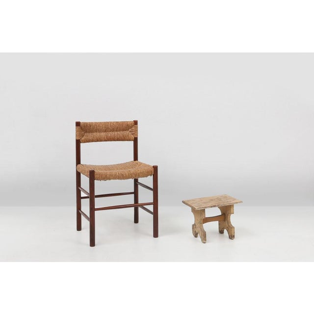 Dating back to circa 1900, this charming French provincial stool captures the essence of rustic, utilitarian design....