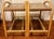 Pair of vintage rattan bamboo side/end tables. Tables are bentwood style, featuring a laminated tan tabletops flanked by...