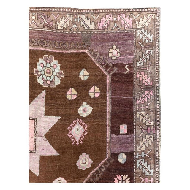 A vintage Turkish Anatolian room size carpet handmade during the mid-20th century. Measures: 7' 5" x 12' 4"
