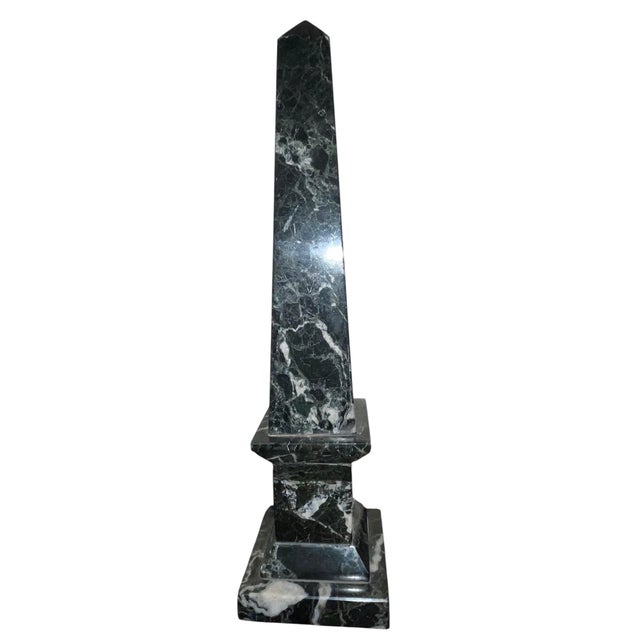 Elegant pair of vintage black marble obelisks with striking white veining, crafted in Italy during the 1980’s. Each...