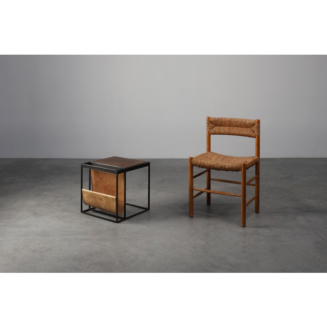 Belgium / 1960 / Magazine holder / metal, wood and leather / Mid-century A striking example of Belgian mid-century design,...