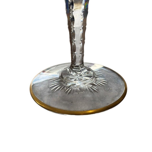 Set of two Saint-Louis Excellence model glasses, 25 cm tall. One of the glasses has very small chips on the diamond-shaped...