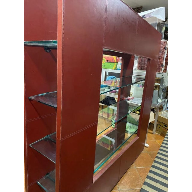 Library 80s burgundy leather with glass shelves ground.