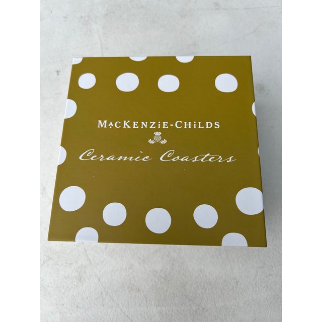 Four Queen Bee Coasters, featuring different buzzing designs. These coasters with their hand-painted surfaces and vibrant...