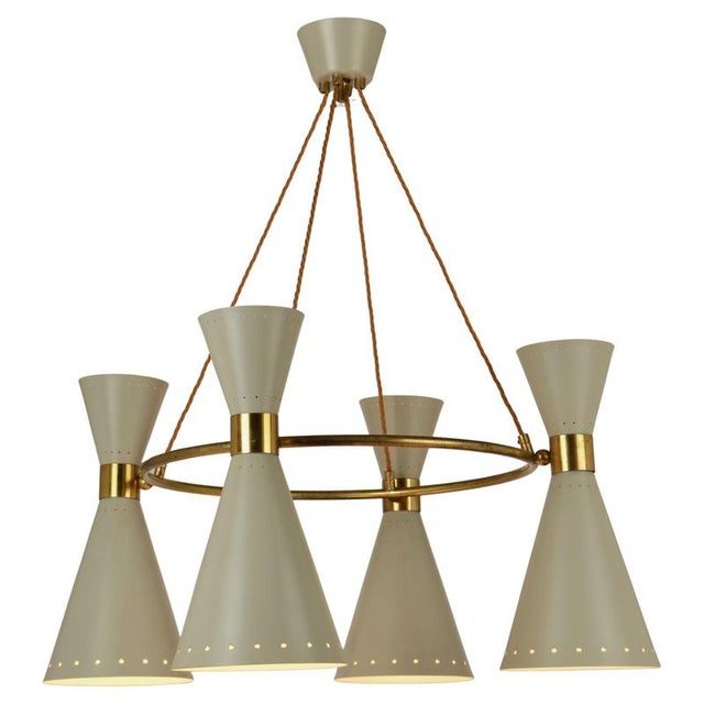Original 1950's diabolo chandelier in the manner of Stilnovo, in brass and light grey metal holds four perforated...