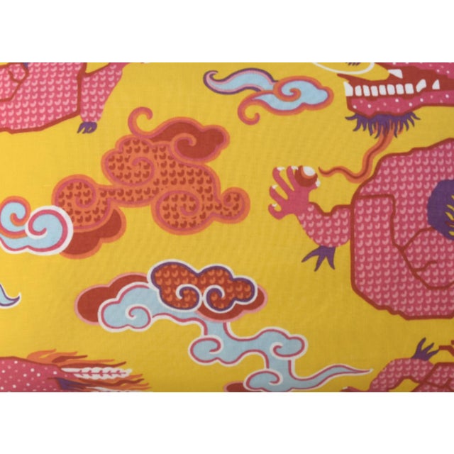 This pillow features Magical Ming Dragon by Johnson Hartig/Libertine for Schumacher. Hand-printed, stylized dragons are...
