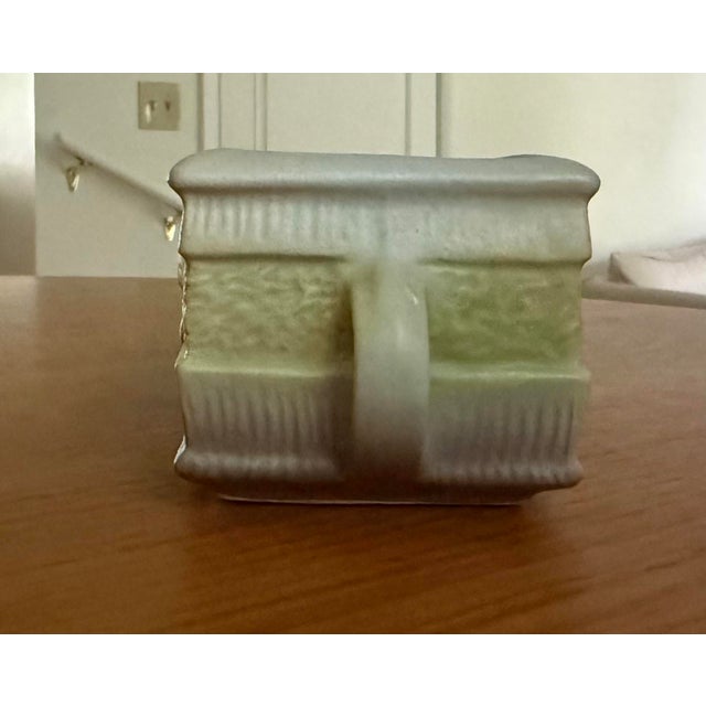 A charming vintage console/window box planter from Roseville Pottery’s “Gardenia” line, introduced in 1950. The piece...