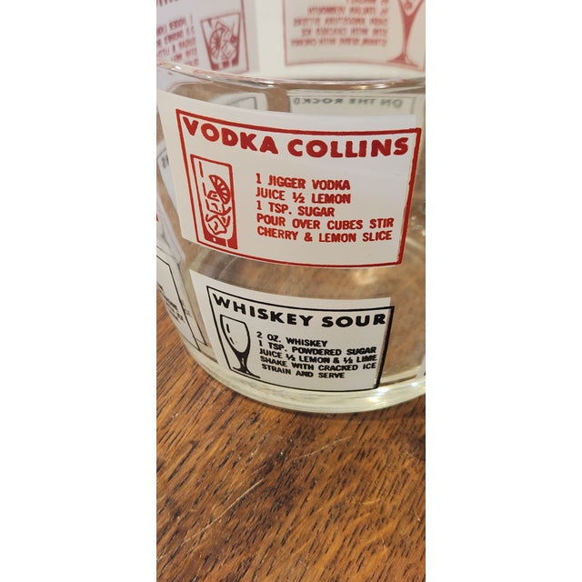 Fantastic Mid-century ice bucket with 12 classic cocktail recipes. Mad men vibes.