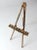 This vintage wooden field easel is perfect for painting or drawing in any setting. Featuring a sturdy tripod stand design...