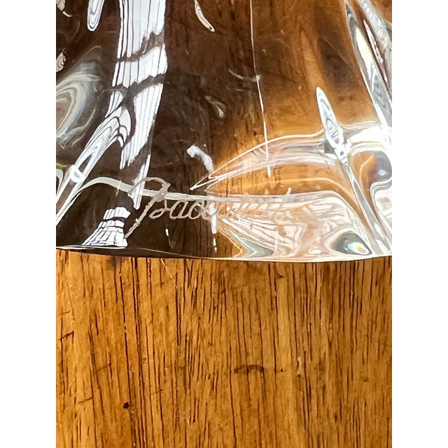Graceful in both form and execution, this vintage Baccarat crystal angel embodies the timeless elegance for which the...