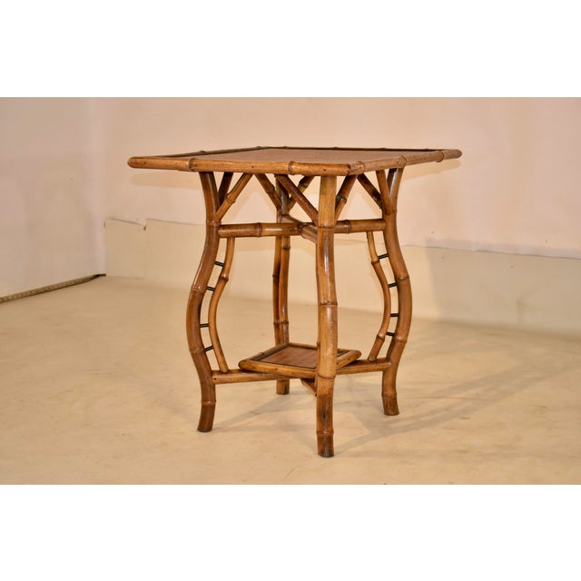 19th century French bamboo table with wonderful Art Nouveau period style. The top has been restored with basketweave...