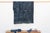 A masterwork of Malian textile heritage featuring deep indigo saturation and symbolic geometric motifs. Originating from...