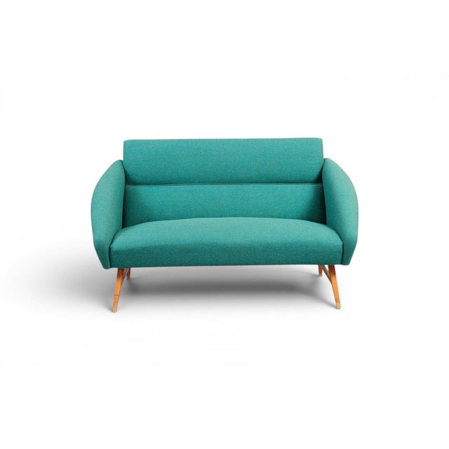 A beautifully proportioned 1955 Swedish loveseat by Svante Skogh for Ruda Snickeri & Möbelfabrik — the "Model 120" —...