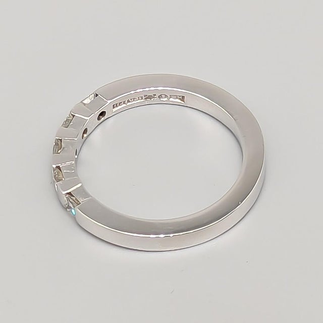 Ring, Gold, 18K, 5.23g, 17mm, Good condition, Contains engraving, 5 princess-cut diamonds of 0.35 ct. Several stones are...