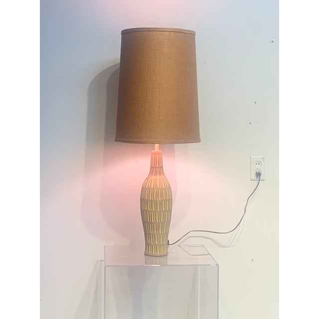 Exquisite Mid Century Italian Ceramic Lamp by Raymor A Classic Italian ceramic lamp made for Raymor, circa 1960s. This...