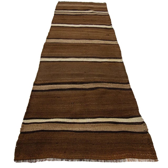 Handwoven vintage modern kilim rug from Kars region of Turkey. Approximately 50-60 years old. In very good condition