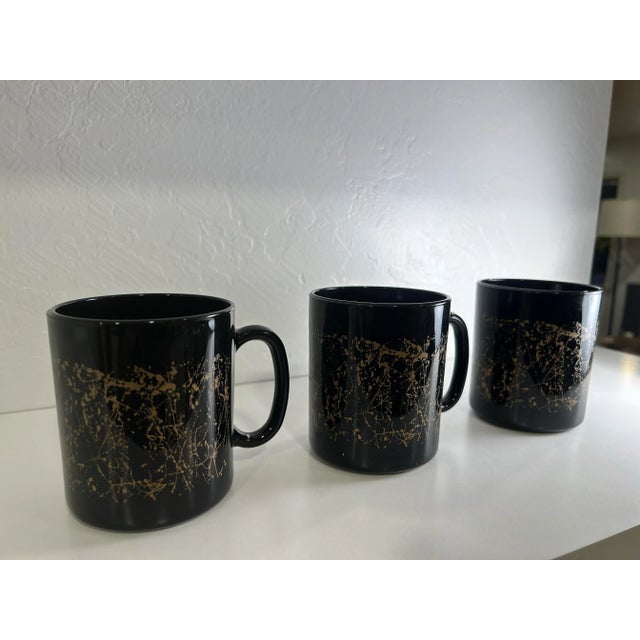 Very cool set of three French made mugs. The splatter effect reminds me of Jackson Pollack who tossed paint on his...