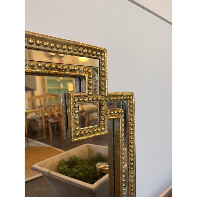 This simple mirror features a gorgeous Art Deco inspired design. With small beading along the frame, there is visual...