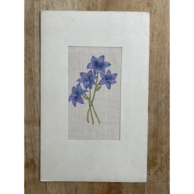 Vibrant purple flowers, this is Indian Mughal art is created from the stone inlay work of Mughal monuments. Featuring...