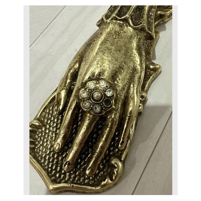J & E Ratcliff Victorian Brass Letter Clip An elegant solid stamped brass Letter Clip in the form of a hand. The details...
