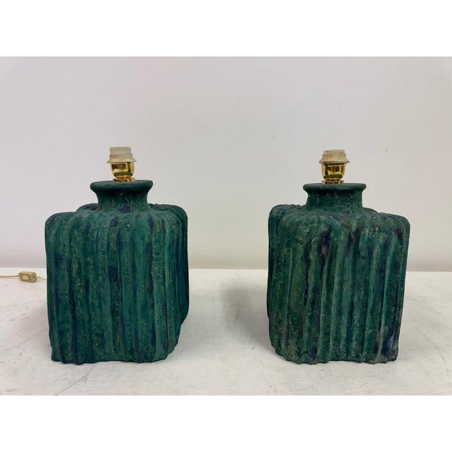 Striking pair of sculptural ceramic table lamps, Italy, circa 1970s. Each lamp features a bold square form with deeply...
