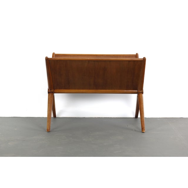 Versatile designed magazine table by T.H. Robbsjohn Gibbings for Widdicomb Furnture. Two angled panels allow for magazines...