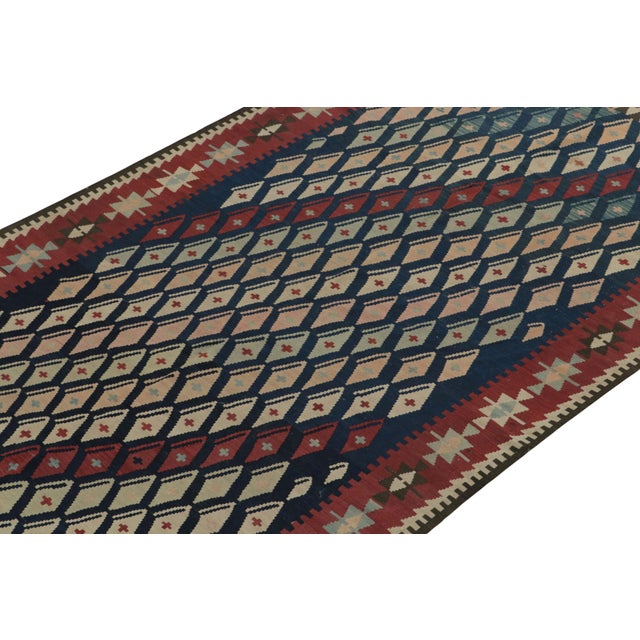 Hand-knotted in wool, a 5x10 vintage kilim rug entering Rug & Kilim’s coveted flat weave collection. This dedicated piece...