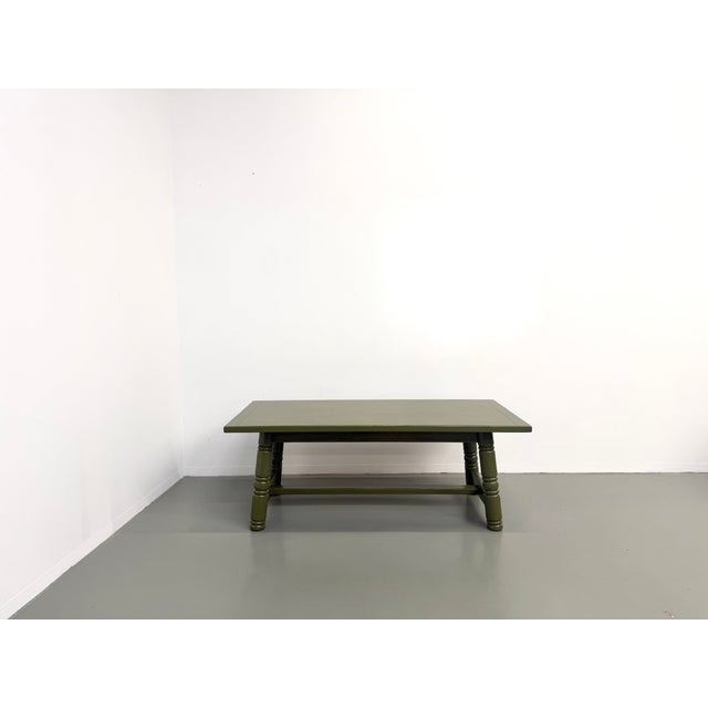 Maison lecan presents this solid pine dining table, circa 1970, in the style of georges robert, entirely refinished in a...