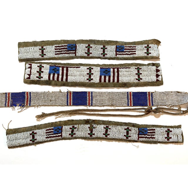 Set of 4 Plains Tribe American Flag Motif Ceremonial Beadwork Strips USA, circa 1900s A rare collection of four Plains...