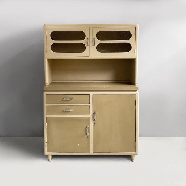 Italian mid-century modern sideboard in glass, light green and beige wood, 1940s Rectangular sideboard composed by two...