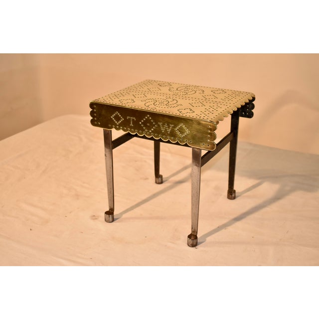 Late 18th/early 19th century brass and steel kettle stand from England. This design is so sweet - it has pierced designs...