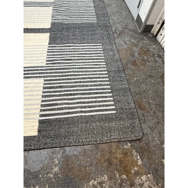 Design Plus Gallery presents a 9ft 2in x 12ft Saba Area Rug from Four Hands. Inspired by minimalist art, a wool-blend area...