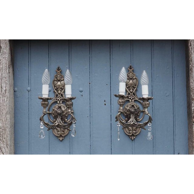Very good vintage condition with natural age-related patina with a few rust marks to the backs. Crystals intact, the...